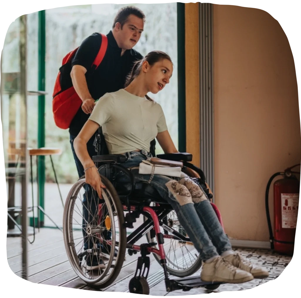 Disabled woman in wheelchair with friend